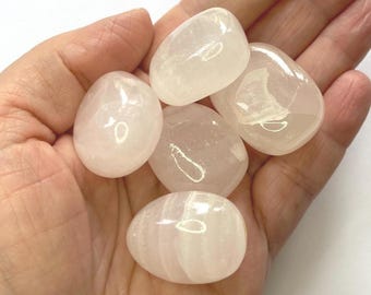 Pink Aragonite Crystal / Tumblestone 25-35mm in an organza bag. Pink Aragonite crystal/ 25-35mm. Pink Aragonite Tumblestone 25-35 mm