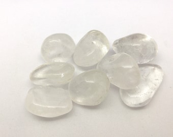 Clear Rock Quartz 25-35mm with an information card in an organza bag