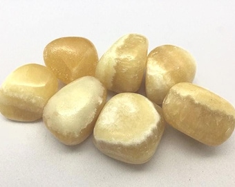 Calcite Yellow, with an info card in an organza bag, 25-35mm, Calcite Yellow 25-35mm. Yellow Calcite 25-35mm