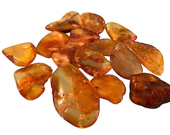 Amber Grade A 15-25mm with an information card in an organza bag. A grade Natural Amber. Genuine Natural Amber A Grade. Salt tested Amber