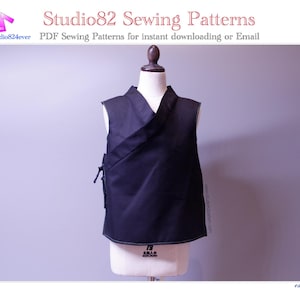 May include: A black wrap-style vest on a mannequin. The vest features a V-neck and side ties. The image includes text that reads "Studio82 Sewing Patterns" and "PDF Sewing Patterns for instant downloading or Email."
