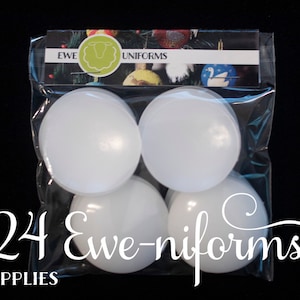 May include: A clear plastic bag containing 24 white round ornaments. The bag has a label that says "Ewe Uniforms Supplies" and "24 Ewe-niforms".