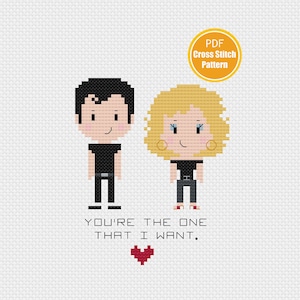 May include: Cross stitch pattern PDF for a couple in black and white clothing with the text "You're the one that I want." and a red heart.