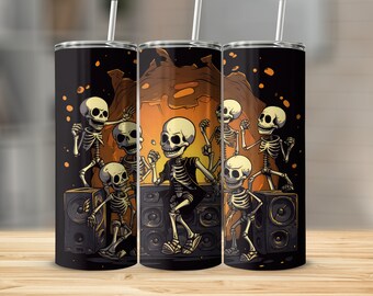Könnte beinhalten: Ein schwarzer und orangefarbener Edelstahlbecher mit einer Grafik von Skeletten, die vor Lautsprechern tanzen. Die Skelette tragen schwarz-weiße Kleidung und haben einen lustigen, festlichen Look.