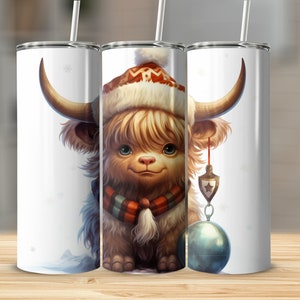 May include: Three white 20oz stainless steel tumblers with a cute cartoon Highland cow wearing a Santa hat and scarf. The cow has a whimsical, festive design and is holding an ornament. The tumblers are perfect for Christmas gifts or winter-themed events. Each tumbler features a straw and lid.