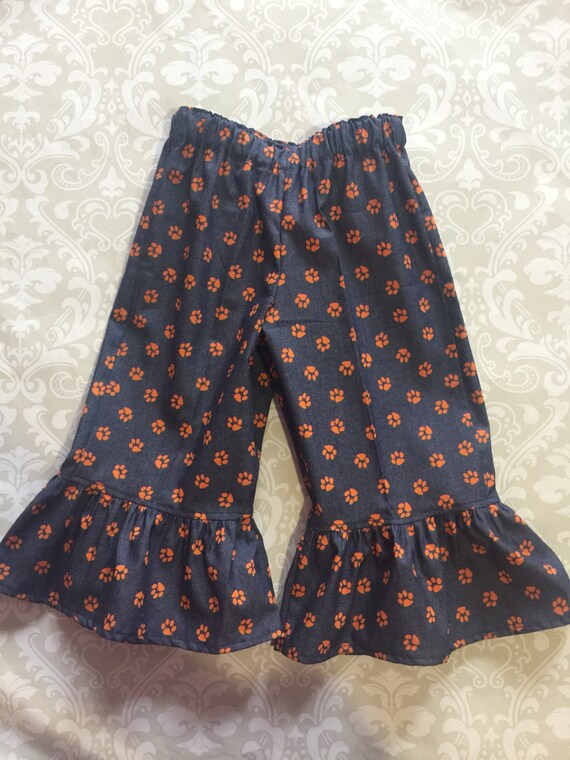 Tiger Paw Print Ruffle Pants Orange Paw Ruffle Jeans Ruffle Pants With Orange Paw Print Orange Paw Print Ruffle Pants For Toddlers