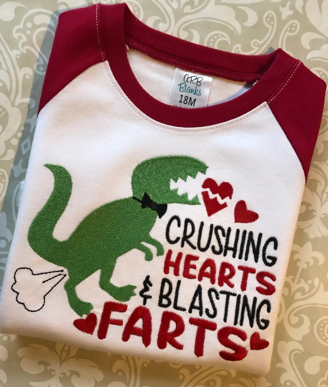 Crushing Hearts and Blasting Farts Embroidered Valentines Raglan Tee
