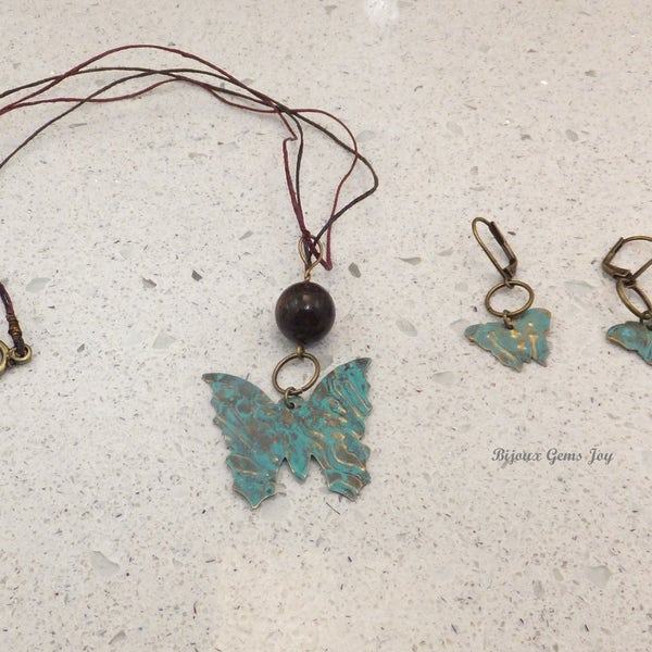 Pendentif et boucles d'oreilles On Wings, bronzite, laiton patiné