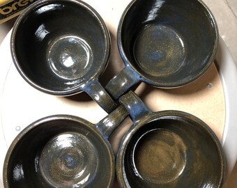 Juego de cuatro tazas