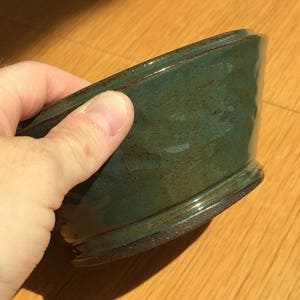 Teal bowl with chattering
