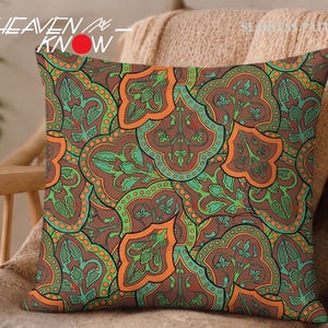 Diseño textil floral bohemio con estampado ornamental marroquí sin costuras, papel digital verde, naranja y marrón.