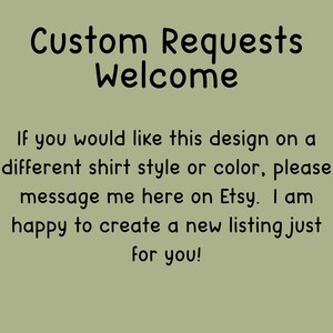 May include: Text on a light green background reads "Custom Requests Welcome." Additional text encourages customers to message the seller on Etsy for custom designs on different shirt styles or colors. The seller is happy to create a new listing.