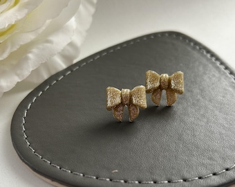 Gold Bow Stud Earrings: Handmade Polymer Clay Jewellery
