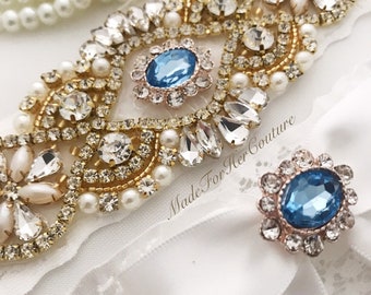 Wedding Garter accented with gold and light blue center stone in rose gold for Something Blue!