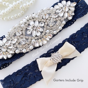 Luxurious crystal, pearl, rhinestone wedding garter set on navy blue lace with GRIP