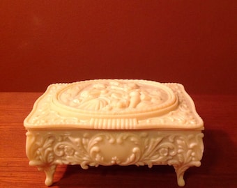 Vintage 1940s cellulose jewelry box with red velvet interior