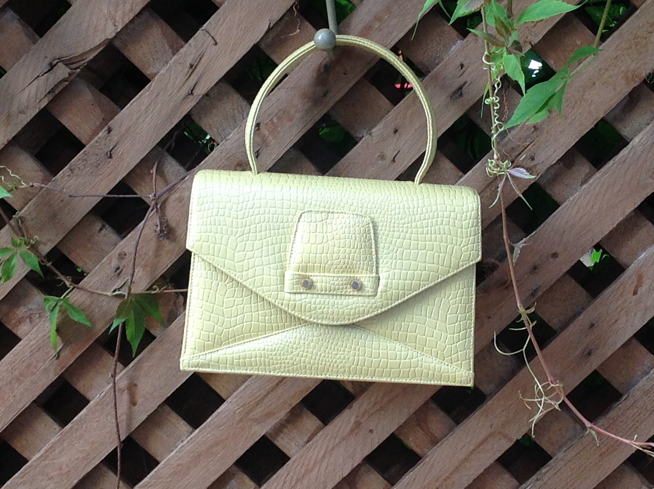 pale yellow clutch bag