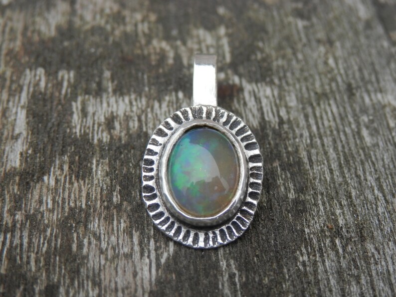 Sterling Silver Pendant Ethiopian Opale White green and Orange beaten silver