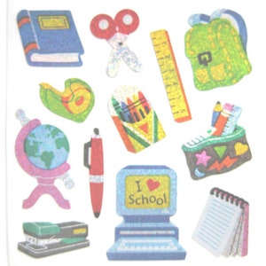 May include: A collection of glittery school-themed stickers. Includes a blue book, red scissors, a yellow ruler, a green backpack, a globe, a red pen, a computer with "I ❤️ School", a stapler, a pencil case, a notepad, and a tape dispenser.