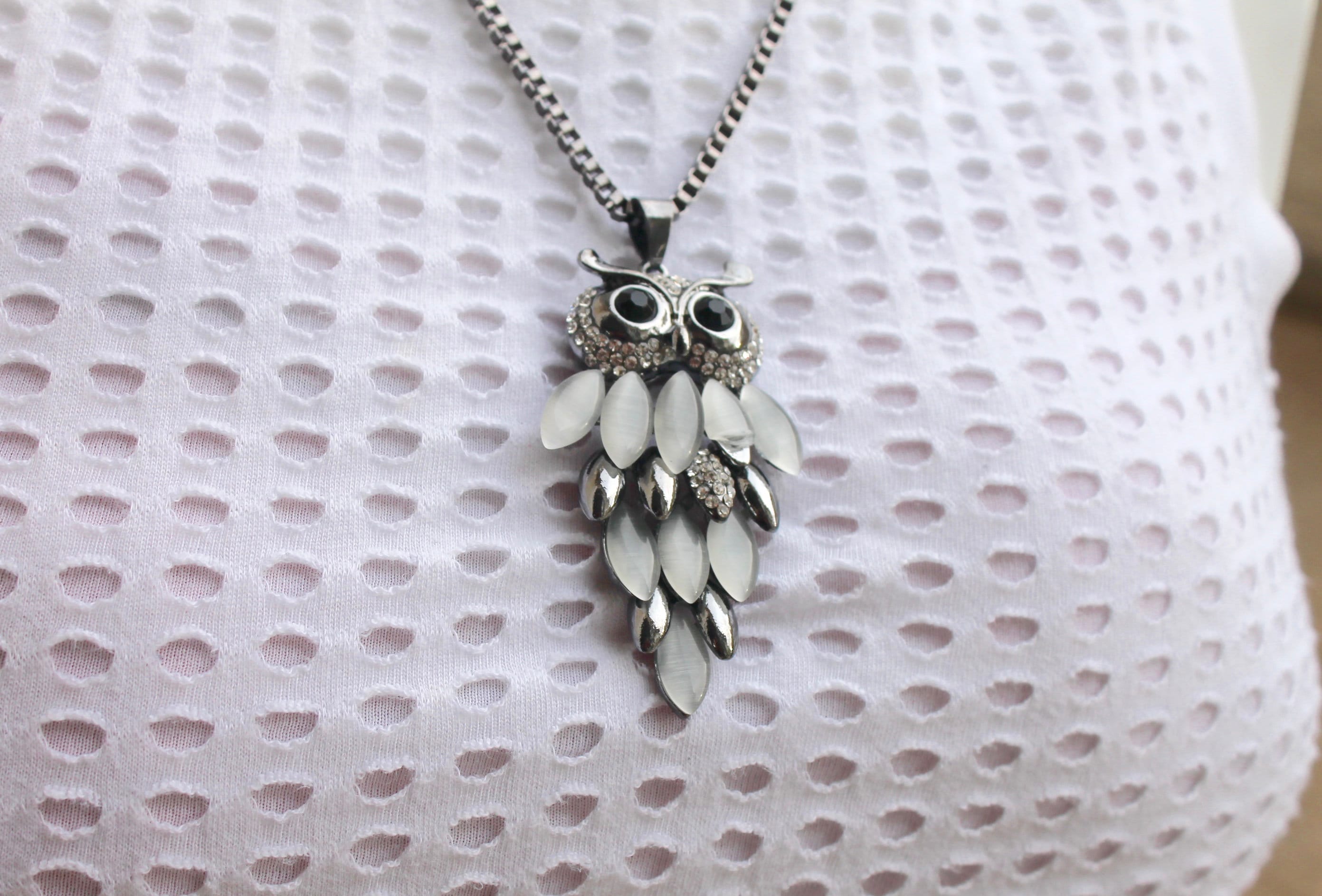 Owl made of metal and quartz ,with black stones eyes,long Necklace fine for a gift