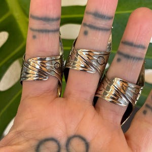 Elevate your style with our big, chunky rings. Designed for those who love bold fashion and aren’t afraid to stand out! Made from alloy metal, Labradorite and Turquoise stones, creating a eye catching designs. These statement rings add personality and flair to any outfit. Whether you're dressing up for a special occasion or adding a unique touch to your everyday look, these rings are the perfect accessory.