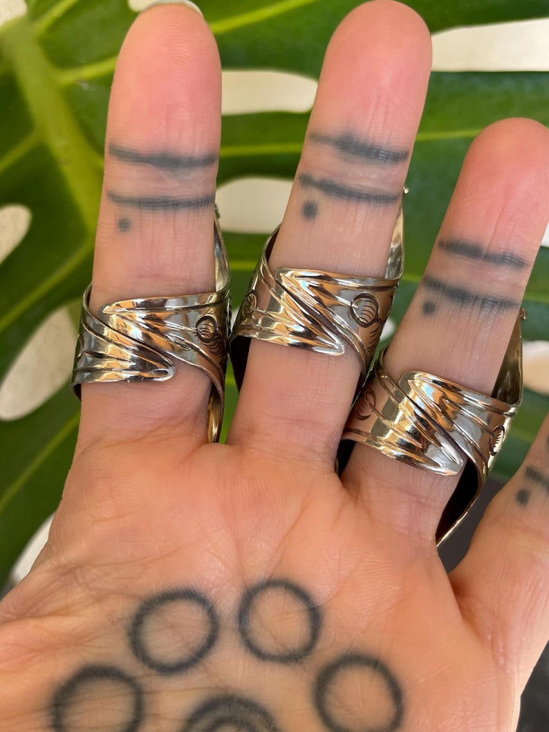 Elevate your style with our big, chunky rings. Designed for those who love bold fashion and aren’t afraid to stand out! Made from alloy metal, Labradorite and Turquoise stones, creating a eye catching designs. These statement rings add personality and flair to any outfit. Whether you're dressing up for a special occasion or adding a unique touch to your everyday look, these rings are the perfect accessory.