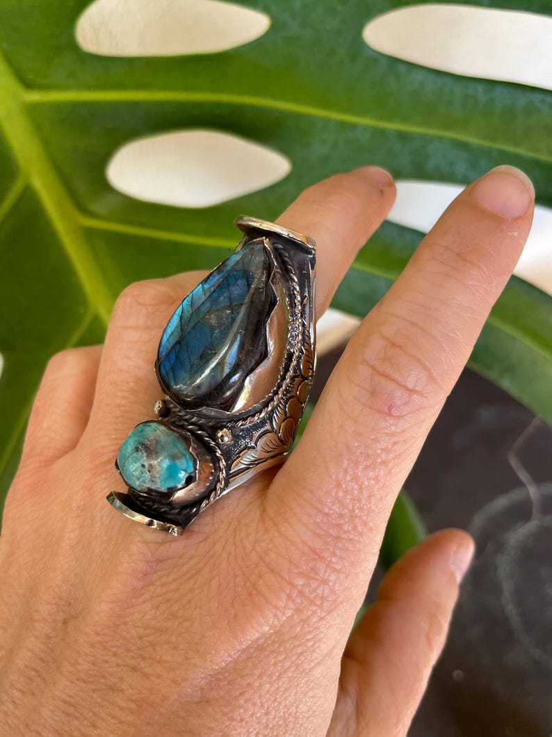 Elevate your style with our big, chunky rings. Designed for those who love bold fashion and aren’t afraid to stand out! Made from alloy metal, Labradorite and Turquoise stones, creating a eye catching designs. These statement rings add personality and flair to any outfit. Whether you're dressing up for a special occasion or adding a unique touch to your everyday look, these rings are the perfect accessory.