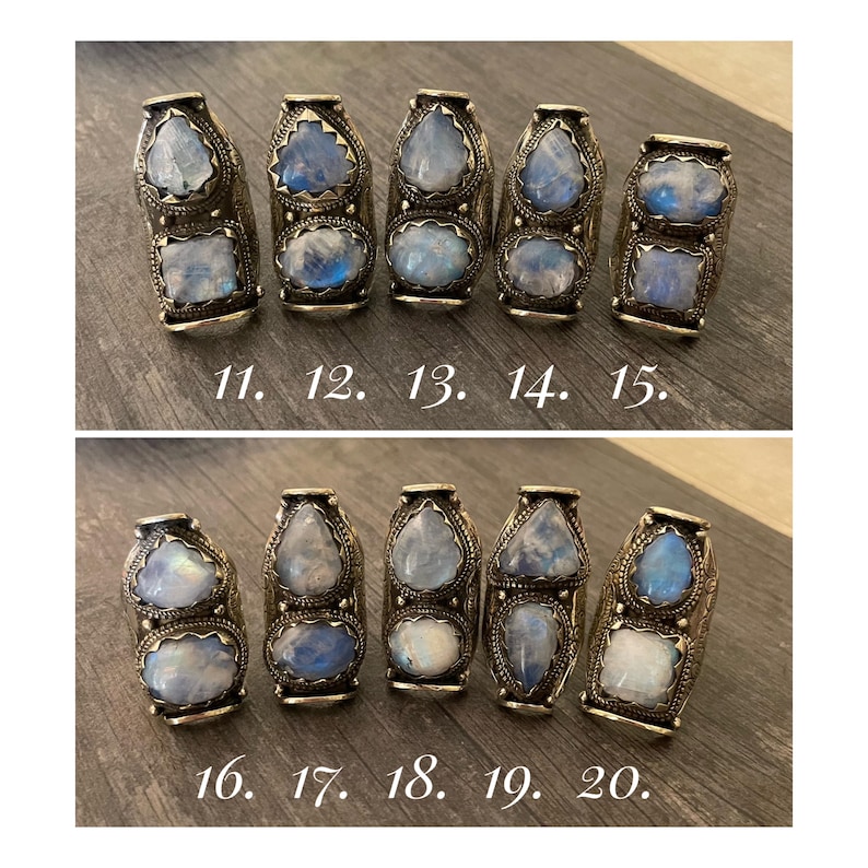 May include: Ten silver rings with moonstone settings. The rings are numbered 11 through 20.