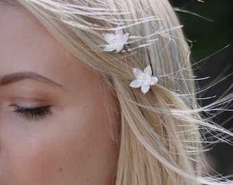 Two handmade sterling silver flower hairpins