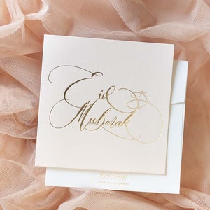 Cartão de Eid Mubarak com folha dourada, cartão de felicitações islâmico para o Ramadã e Eid. Cartão de felicitações de Eid Mubarak - Blush claro com folha dourada.