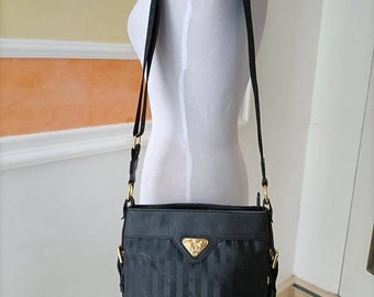 Mollerus, sac vintage, toile noire et cuir.