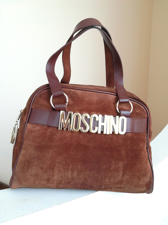 Moschino, suede bag and leather bag.
