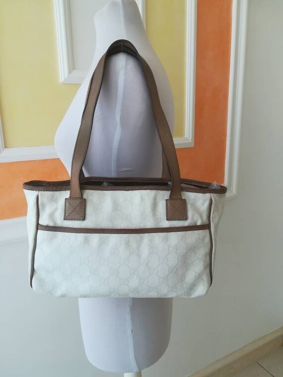 Gucci, canvas bag and leather bag.