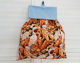 Bread in a nice buns and blue gingham print bag