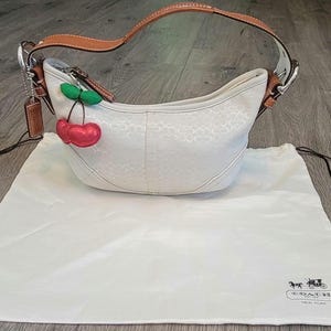 Coach Hampton Soho Eggshell Off White Jacquard C&#39;s Logo Signature with Silver Tone Buckle Hobo Shoulder Bag