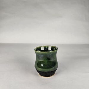 4 oz Viking aquavit.  Shotglass.  Green and black glazing.  Handmade pottery. Anglo Saxon