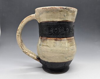 16 oz Silk roads inspired mug. Creamy brown blend and matte black glazing.  Handmade pottery. Anglo Saxon