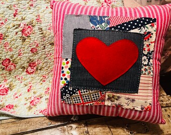 Heart quilted decorative pillow