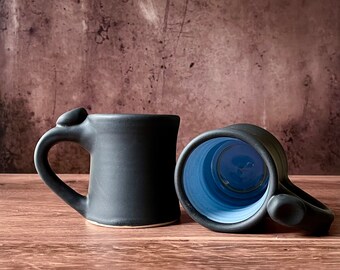 Ceramic mug with thumb rest (12 oz)- matte charcoal black glaze with blue interior, handmade pottery mug, matte black, mug gift for mom