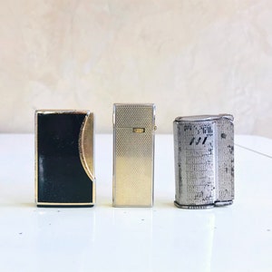MECHEROS de COLECCIÓN lote de tres encendedores de gas y de gasolina Sharps Coronette mecheros de bolsillo vintage