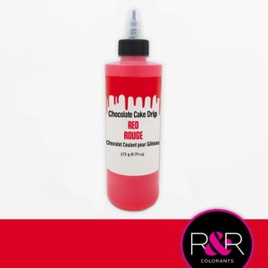May include: A red bottle of chocolate cake drip with the text "Chocolate Cake Drip Red Rouge Chocolat Coulant pour Gâteau 275 g (9.71 oz)"