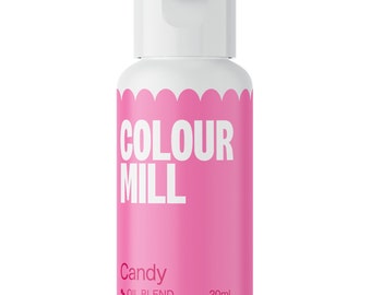 May include: A pink bottle with a white cap and label. The label says "COLOUR MILL" in white letters and "Candy OIL BLEND" in smaller white letters. The bottle contains 20 ml of food coloring.