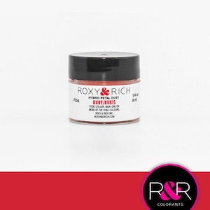 May include: A small jar of red-orange hybrid petal dust labeled "ROXY RICH, FDA HYBRID PETAL DUST RUBY/RUBIS FOOD COLOUR, USE ONE OR MORE OF THE FOOD COLOURS, ROXYANDRICH.COM, RR COLORANTS".