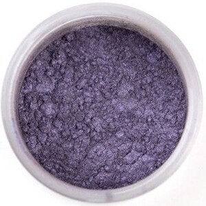 May include: A small jar of purple edible luster dust. The dust has a shimmery, metallic finish.