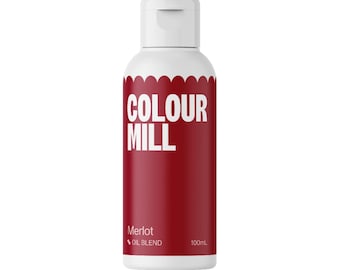 May include: A 100 ml bottle of Colour Mill Merlot Oil Blend food coloring. The bottle is white with a red label that says "Colour Mill" in white letters. The label also says "Merlot Oil Blend" in white letters.