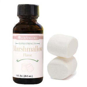 May include: A brown glass bottle with a white label that reads "LORANN OILS SUPER-STRENGTH Marshmallow Flavor 1 Fl. Oz. (29.5 mL)". Two white marshmallows are next to the bottle.