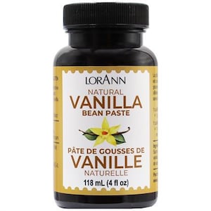 May include: A glass bottle of Lorann Natural Vanilla Bean Paste. The bottle is labeled with the product name and ingredients in both English and French. The bottle contains 118 ml (4 fl oz) of vanilla bean paste.