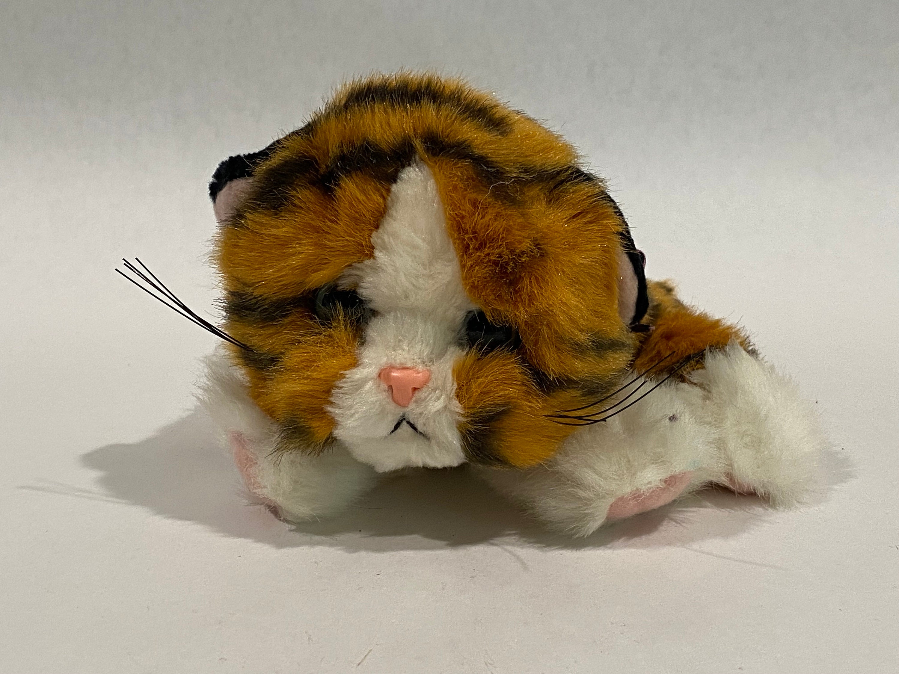 stuffed cat with kittens