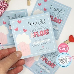 May include: A blue and pink printable Valentine's Day card with a beer mug graphic and the text "Teachers like you keep our world afloat. We hope your Valentine's Day bubbles over with fun! The Smith Family."