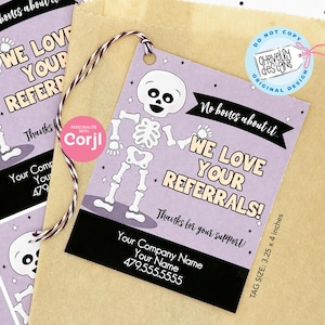 May include: Purple and black Halloween-themed referral tag with a skeleton illustration and the text "No bones about it... We love your referrals! Thanks for your support!"  Your Company Name, Your Name, 479.555.5555. Tag size: 3.25 x 4 inches.
